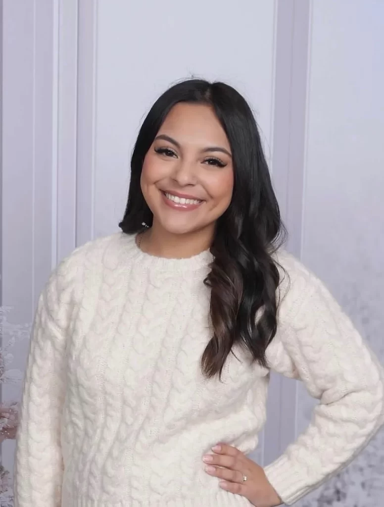 Portrait of Dezirae Wrtaza, optician and front office team member at Dr. Alex Liu’s clinic.